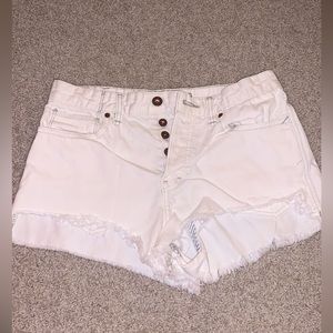 White distressed free people high waisted shorts size 28!